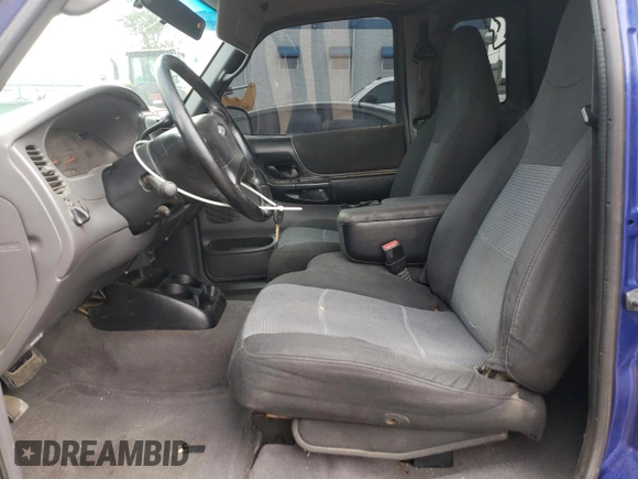 2003 Ford Ranger XL Fleet with VIN 1FTZR45E03PA09155, listed as a Copart auction lot 60283335 with 219,406 mi miles and Salvage title. Bid and sale history available at DreamBid. Image 7.