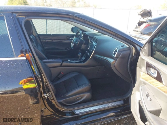 2017 Nissan Maxima SR with VIN 1N4AA6AP0HC365858, listed as a IAAI auction lot 41869483 with 105,952 mi miles. Bid and sale history available at carsss.com. Image 5.