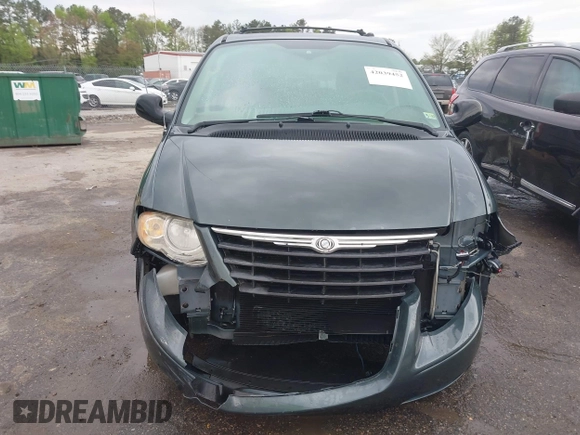 2006 Chrysler Town & Country LX with VIN 2A4GP44R96R615942, listed as a IAAI auction lot 42039452 with 158,009 mi miles and . Bid and sale history available at DreamBid. Image 12.