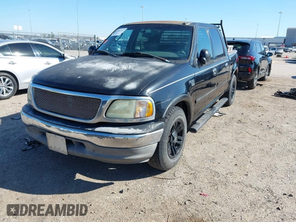 2003 Ford F-150 XLT with VIN 1FTRW07L43KB05221, listed as a IAAI auction lot 41762332 with 226,660 mi miles. Bid and sale history available at carsss.com. Image 19.