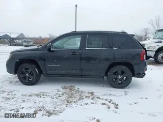 2016 Jeep Compass High Altitude Edition with VIN 1C4NJDEB8GD758174, listed as a IAAI auction lot 41235089 with 144,841 mi miles. Bid and sale history available at carsss.com. Image 14.
