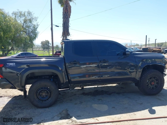 2024 Toyota Tacoma 4WD SR5 with VIN 3TMLB5JN4RM039036, listed as a IAAI auction lot 41813562 with 2,112 mi miles. Bid and sale history available at carsss.com. Image 14.