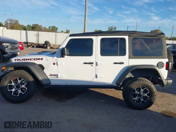 2022 Jeep Wrangler Unlimited Rubicon with VIN 1C4HJXFN4NW123803, listed as a IAAI auction lot 40994742 with 36,156 mi miles and . Bid and sale history available at DreamBid. Image 14.