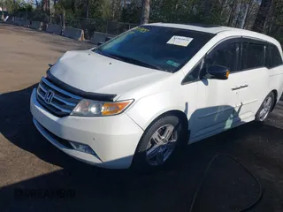 2012 Honda Odyssey Touring with VIN 5FNRL5H93CB146753, listed as a IAAI auction lot 41984850 with 155,309 mi miles and . Bid and sale history available at DreamBid. Image 17.