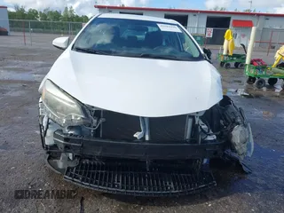 2016 Toyota Corolla L z VIN 2T1BURHE0GC641909, wystawiony jako IAAI lot #42583396 z przebiegiem 124 790 mil mil oraz . Historia ofert i sprzedaży dostępna na DreamBid. Obrazek 13.