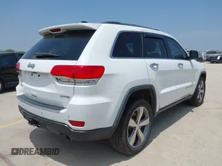 2014 Jeep Grand Cherokee Limited with VIN 1C4RJFBT4EC259448, listed as a IAAI auction lot 42285739 with 129,120 mi miles and . Bid and sale history available at DreamBid. Image 4.