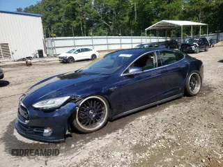 2013 Tesla Model S Performance с VIN 5YJSA1DP1DFP04055, выставлен на аукционе Copart как лот 57418615 с пробегом Не указан миль и Списание • Salvage title. История ставок и продаж доступна на DreamBid. Изображение 1.