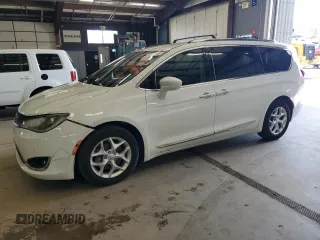 2019 Chrysler Pacifica Touring L with VIN 2C4RC1BGXKR666001, listed as a Copart auction lot 54199865 with 243,592 mi miles and Clean title. Bid and sale history available at DreamBid. Image 1.