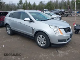 2014 Cadillac SRX Luxury Collection z VIN 3GYFNEE33ES670356, wystawiony jako IAAI lot #42008087 z przebiegiem 59 953 mil mil oraz . Historia ofert i sprzedaży dostępna na DreamBid. Obrazek 1.