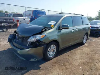 2014 Toyota Sienna XLE with VIN 5TDYK3DC6ES414892, listed as a IAAI auction lot 42545666 with 135,805 mi miles and . Bid and sale history available at DreamBid. Image 18.