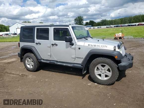 2010 Jeep Wrangler Unlimited Rubicon with VIN 1J4BA6H18AL222429, listed as a Copart auction lot 58348815 with 80,317 mi miles and Salvage title. Bid and sale history available at DreamBid. Image 4.