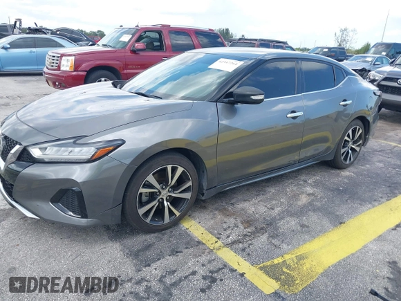 2020 Nissan Maxima SV z VIN 1N4AA6CV6LC373659, wystawiony jako IAAI lot #42347264 z przebiegiem 77 812 mil mil oraz . Historia ofert i sprzedaży dostępna na DreamBid. Obrazek 2.