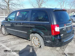 2016 Chrysler Town & Country Touring with VIN 2C4RC1BG7GR231704, listed as a IAAI auction lot 41306140 with 165,890 mi miles. Bid and sale history available at carsss.com. Image 6.
