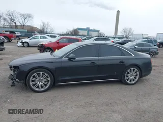 2012 Audi A8 с VIN WAUAVAFD0CN035731, выставлен на аукционе IAAI как лот 41286022 с пробегом 82 835 миль миль и . История ставок и продаж доступна на DreamBid. Изображение 15.