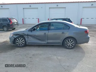 2016 Volkswagen Jetta Sedan 1.4T SE with VIN 3VWD67AJ7GM281671, listed as a IAAI auction lot 41385896 with 153,168 mi miles. Bid and sale history available at carsss.com. Image 14.