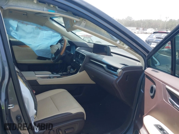 2016 Lexus RX 450h z VIN 2T2BGMCAXGC005914, wystawiony jako IAAI lot #42156530 z przebiegiem 94 050 mil mil oraz . Historia ofert i sprzedaży dostępna na DreamBid. Obrazek 5.