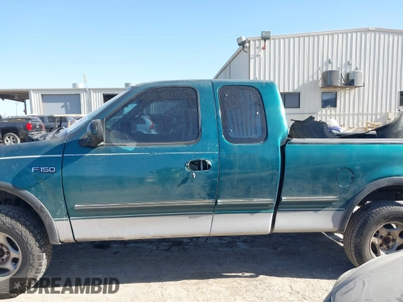 1997 Ford F-150 XL with VIN 1FTEX18L0VKC14651, listed as a IAAI auction lot 41228875 with 251,074 mi miles. Bid and sale history available at carsss.com. Image 15.