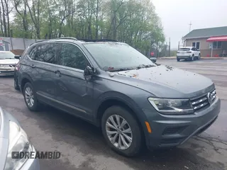 2018 Volkswagen Tiguan SEL z VIN 3VV2B7AX6JM131487, wystawiony jako IAAI lot #42192665 z przebiegiem 52 860 mil mil oraz . Historia ofert i sprzedaży dostępna na DreamBid. Obrazek 1.