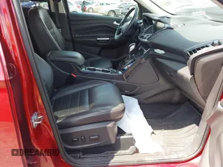 2015 Ford Escape Titanium z VIN 1FMCU9J91FUC58933, wystawiony jako IAAI lot #42583736 z przebiegiem 147 359 mil mil oraz . Historia ofert i sprzedaży dostępna na DreamBid. Obrazek 5.