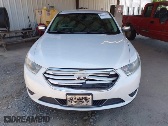 2015 Ford Taurus Limited z VIN 1FAHP2F89FG101017, wystawiony jako IAAI lot #42284459 z przebiegiem 183 167 mil mil oraz . Historia ofert i sprzedaży dostępna na DreamBid. Obrazek 12.