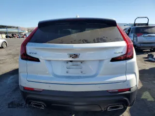 2021 Cadillac XT4 FWD Luxury z VIN 1GYAZAR49MF081955, wystawiony jako Copart lot #76611074 z przebiegiem 34 635 mil mil oraz Szkoda całkowita • Salvage title. Historia ofert i sprzedaży dostępna na DreamBid. Obrazek 6.