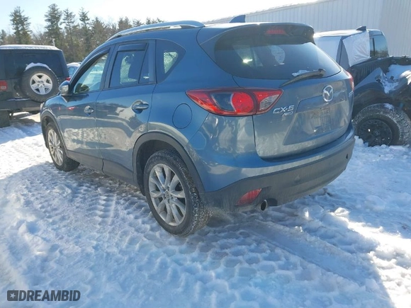 2015 Mazda CX-5 Grand Touring with VIN JM3KE4DY1F0541592, listed as a IAAI auction lot 41585018 with 113,016 mi miles. Bid and sale history available at carsss.com. Image 3.