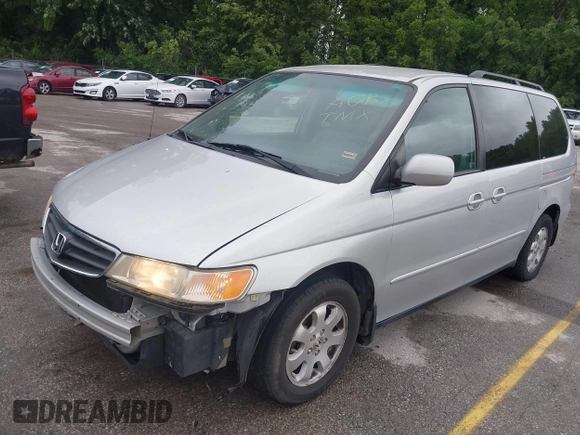 2004 Honda Odyssey EX-L with VIN 5FNRL18934B076486, listed as a IAAI auction lot 42315160 with 209,467 mi miles and . Bid and sale history available at DreamBid. Image 2.
