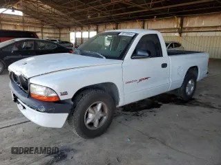 1999 Dodge Dakota SLT with VIN 1B7FL26X6XS180827, listed as a Copart auction lot 85789944 with 85,166 mi miles and Salvage Title. Bid and sale history available at carsss.com. Image 1.