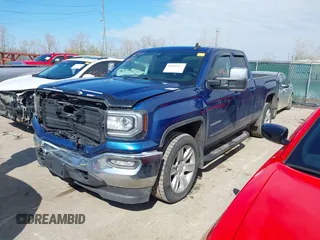 2019 GMC Sierra 1500 SLE z VIN 2GTV2MEC5K1102900, wystawiony jako IAAI lot #41996612 z przebiegiem 69 502 mil mil oraz . Historia ofert i sprzedaży dostępna na DreamBid. Obrazek 18.