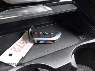 2023 BMW X4 xDrive30i z VIN 5UX33DT01P9P86340, wystawiony jako IAAI lot #42113558 z przebiegiem 27 226 mil mil oraz . Historia ofert i sprzedaży dostępna na DreamBid. Obrazek 11.