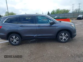 2016 Honda Pilot EX-L with VIN 5FNYF6H51GB097337, listed as a IAAI auction lot 42173415 with 145,415 mi miles. Bid and sale history available at carsss.com. Image 13.