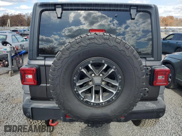 2024 Jeep Wrangler Rubicon X with VIN 1C4RJXFG2RW153197, listed as a Copart auction lot 76521384 with 3,897 mi miles and Salvage title. Bid and sale history available at DreamBid. Image 6.