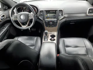 2017 Jeep Grand Cherokee Limited 75th Anniversary with VIN 1C4RJFBG1HC683371, listed as a Copart auction lot 45853175 with 142,277 mi miles and Salvage title. Bid and sale history available at DreamBid. Image 8.