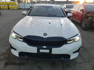 2022 BMW 3 Series 330i xDrive with VIN 3MW5R7J06N8C49660, listed as a Copart auction lot 83515904 with 33,966 mi miles and Salvage Title. Bid and sale history available at carsss.com. Image 5.