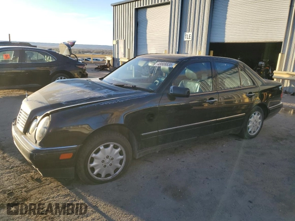 1999 Mercedes-Benz E-Class with VIN WDBJF82H9XX026911, listed as a Copart auction lot 48808835 with 205,953 mi miles and Salvage Title. Bid and sale history available at carsss.com. Image 1.