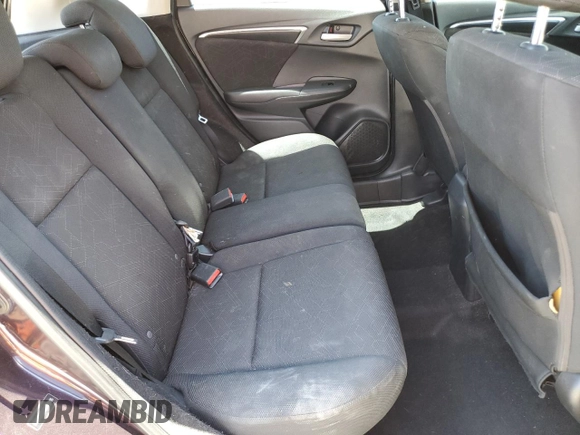 2015 Honda Fit EX z VIN 3HGGK5G82FM745065, wystawiony jako Copart lot #58358525 z przebiegiem 104 769 mil mil oraz Szkoda całkowita • Salvage title. Historia ofert i sprzedaży dostępna na DreamBid. Obrazek 11.