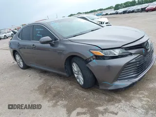 2019 Toyota Camry LE z VIN 4T1B11HK3KU255279, wystawiony jako IAAI lot #41755467 z przebiegiem 106 763 mil mil oraz . Historia ofert i sprzedaży dostępna na DreamBid. Obrazek 1.