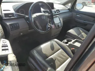 2014 Honda Odyssey Touring с VIN 5FNRL5H91EB005876, выставлен на аукционе Copart как лот 51446355 с пробегом 164 962 миль миль и Списание • Salvage title. История ставок и продаж доступна на DreamBid. Изображение 8.