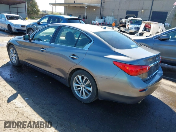 2014 Infiniti Q50 with VIN JN1BV7AP0EM682444, listed as a IAAI auction lot 41857312 with 140,765 mi miles. Bid and sale history available at carsss.com. Image 3.