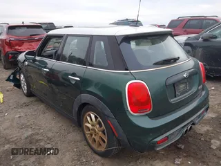 2015 MINI Hardtop 4 Door S with VIN WMWXU3C5XF2B59066, listed as a IAAI auction lot 40900773 with 14,618 mi miles and . Bid and sale history available at DreamBid. Image 3.
