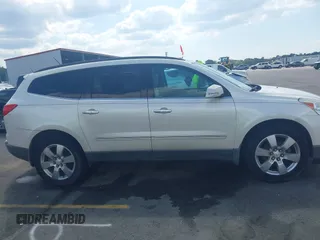 2011 Chevrolet Traverse LTZ with VIN 1GNKVLED5BJ167465, listed as a IAAI auction lot 42002979 with 167,271 mi miles and . Bid and sale history available at DreamBid. Image 13.