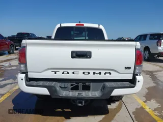 2023 Toyota Tacoma SR z VIN 3TYRZ5CN5PT034397, wystawiony jako IAAI lot #42055222 z przebiegiem 39 144 mil mil oraz . Historia ofert i sprzedaży dostępna na DreamBid. Obrazek 17.