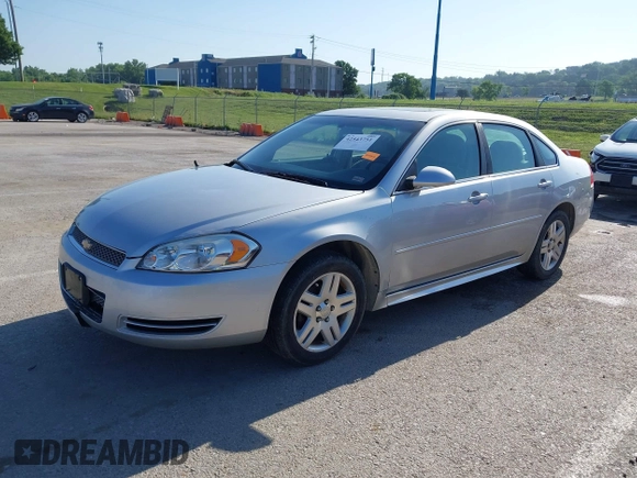 2014 Chevrolet Impala LT with VIN 2G1WB5E31E1180713, listed as a IAAI auction lot 42543751 with 263,010 mi miles and . Bid and sale history available at DreamBid. Image 2.