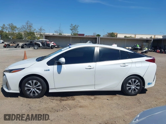 2021 Toyota Prius LE with VIN JTDKAMFP2M3184900, listed as a IAAI auction lot 42014569 with 81,563 mi miles and . Bid and sale history available at DreamBid. Image 14.