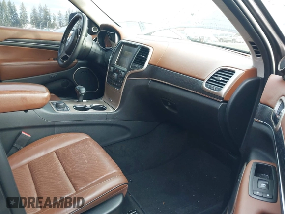 2015 Jeep Grand Cherokee Summit with VIN 1C4RJFJTXFC911170, listed as a IAAI auction lot 41523164 with 74,133 mi miles. Bid and sale history available at carsss.com. Image 5.