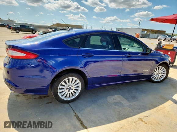 2013 Ford Fusion SE Hybrid with VIN 3FA6P0LU0DR273438, listed as a Copart auction lot 60033665 with 74,474 mi miles and Salvage title. Bid and sale history available at DreamBid. Image 3.