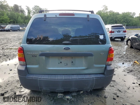 2006 Ford Escape XLT with VIN 1FMYU93146KC00081, listed as a Copart auction lot 56724835 with 243,213 mi miles and Salvage title. Bid and sale history available at DreamBid. Image 6.
