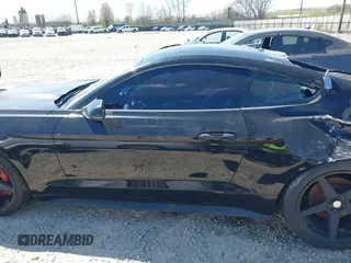 2015 Ford Mustang EcoBoost z VIN 1FA6P8TH1F5341043, wystawiony jako IAAI lot #42046760 z przebiegiem 61 291 mil mil oraz . Historia ofert i sprzedaży dostępna na DreamBid. Obrazek 15.