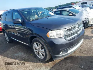 2013 Dodge Durango Crew z VIN 1C4RDHDG4DC686310, wystawiony jako IAAI lot #42705174 z przebiegiem 143 608 mil mil oraz . Historia ofert i sprzedaży dostępna na DreamBid. Obrazek 1.