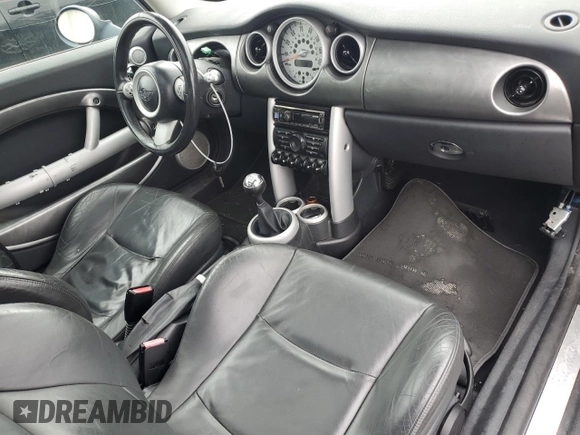 2005 MINI Hardtop S с VIN WMWRE33465TD90908, выставлен на аукционе Copart как лот 50671585 с пробегом Не указан миль и Списание • Salvage title. История ставок и продаж доступна на DreamBid. Изображение 8.